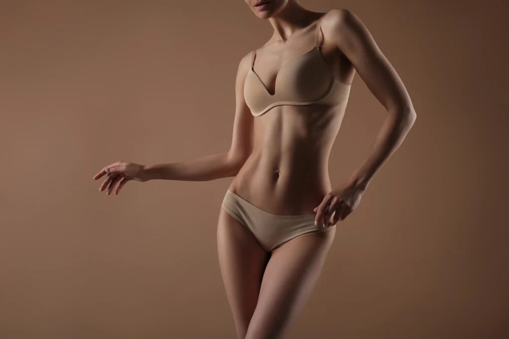 Slim woman after body contouring treatments at Doctor Slim Med Spa in Lewisville TX